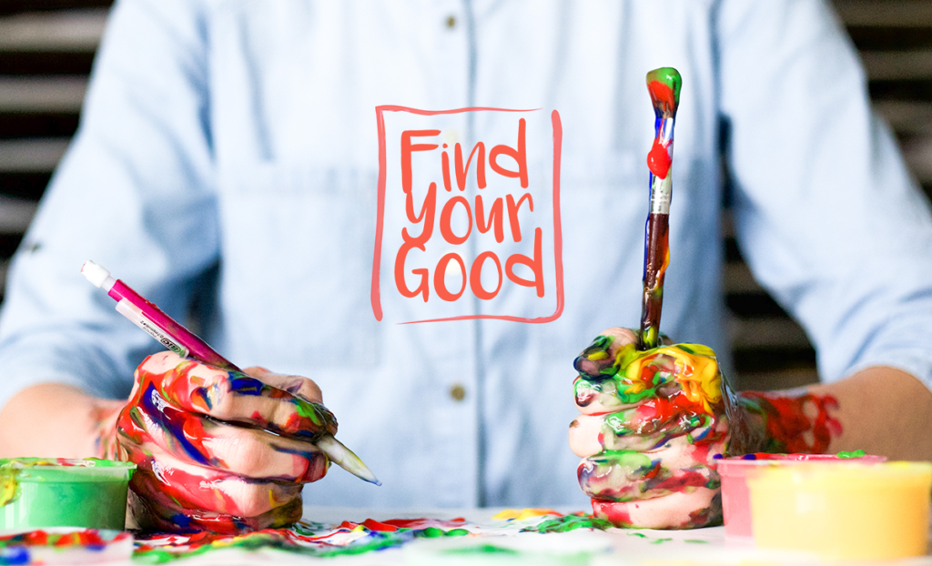 Picture of a person painting with paint everywhere. 